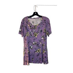 Logo by Lori Goldstein purple blouse